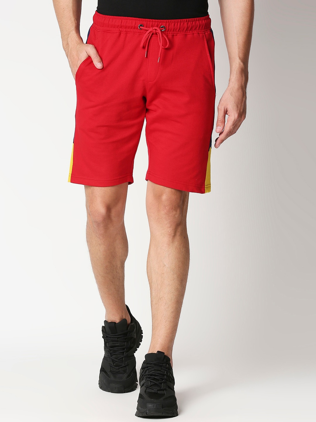 

Bewakoof Men Red Solid Mid-Rise Regular Shorts