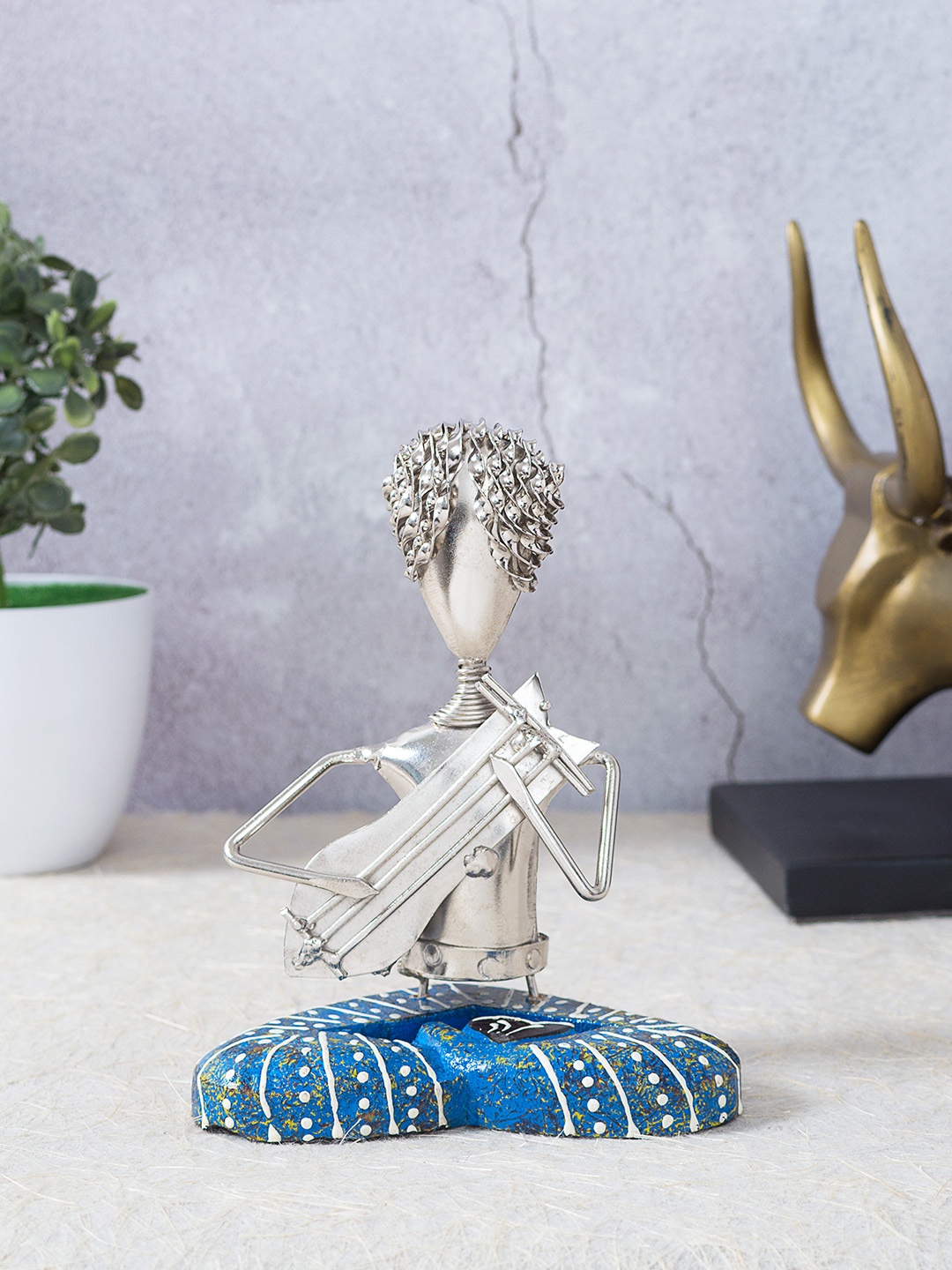 

Golden Peacock Silver-Toned & Blue Iron Handcrafted Musicians Showpieces