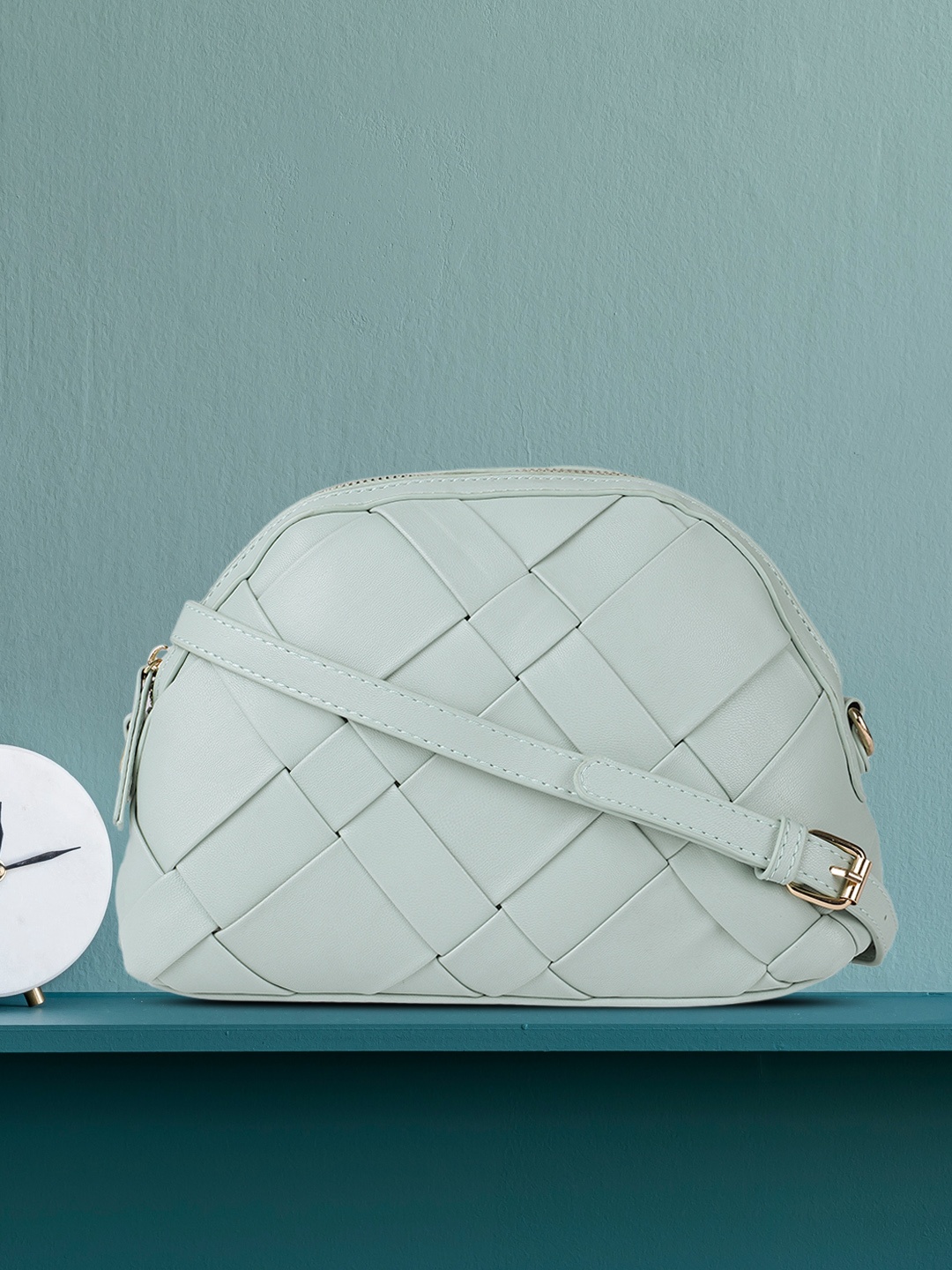 

CORSICA Light Blue Textured Sling Bag