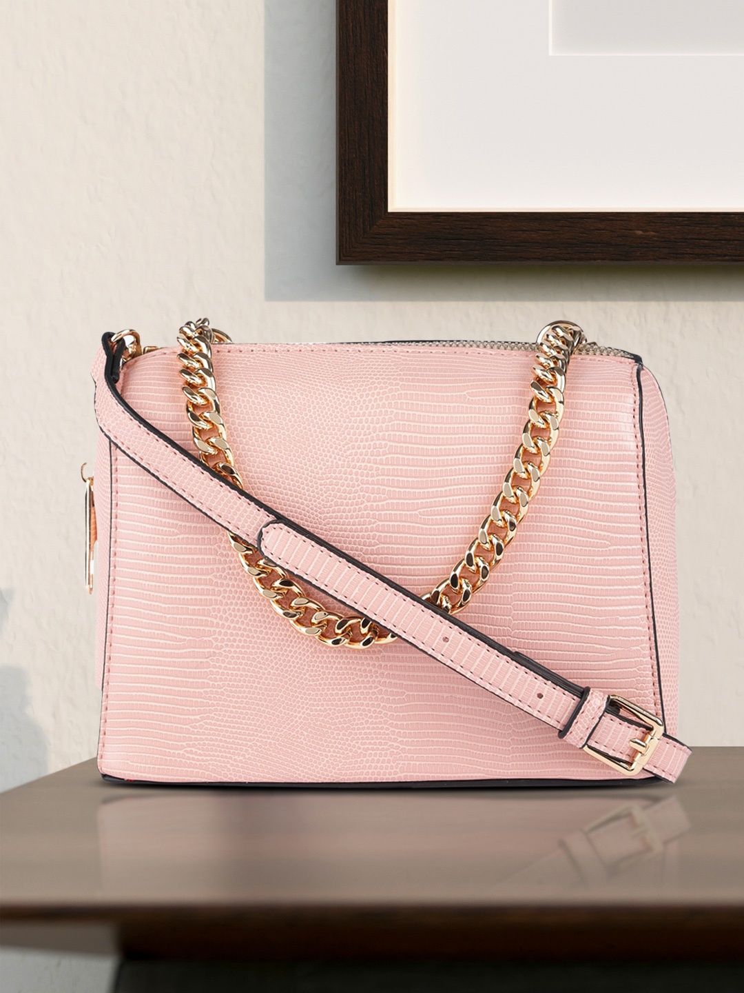 

CORSICA Pink Animal Textured Structured Sling Bag