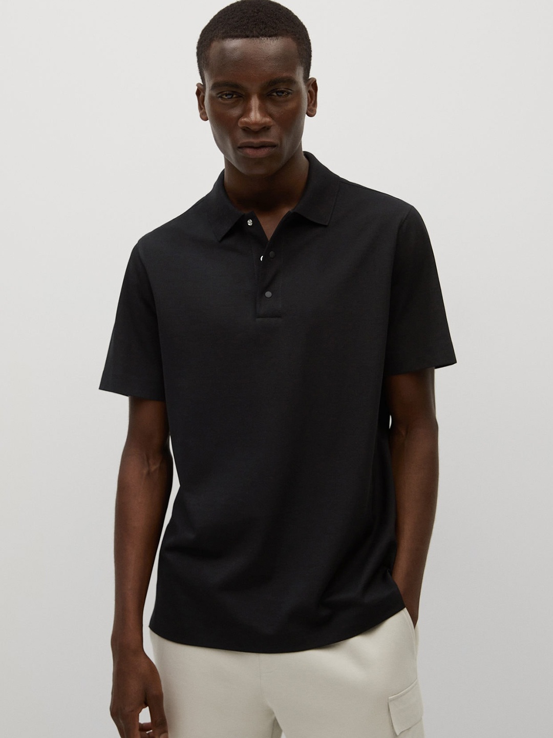 

MANGO MAN Men Black Solid Polo Collar T-shirt