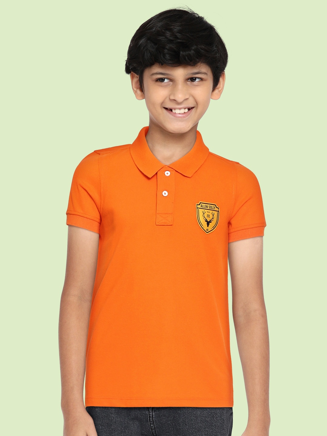 

Allen Solly Junior Boys Orange Solid Polo Collar Applique Detail T-shirt