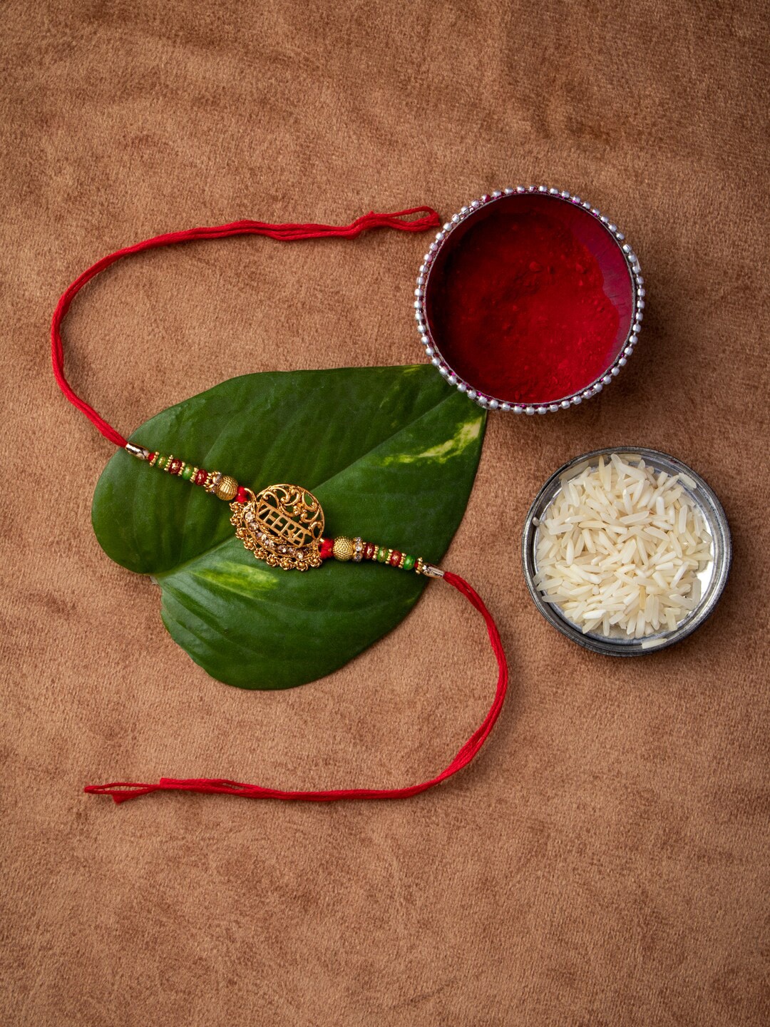 

MORKANTH JEWELLERY Gold-Toned & Stone-Studded Beaded Handcrafted Thread Rakhi