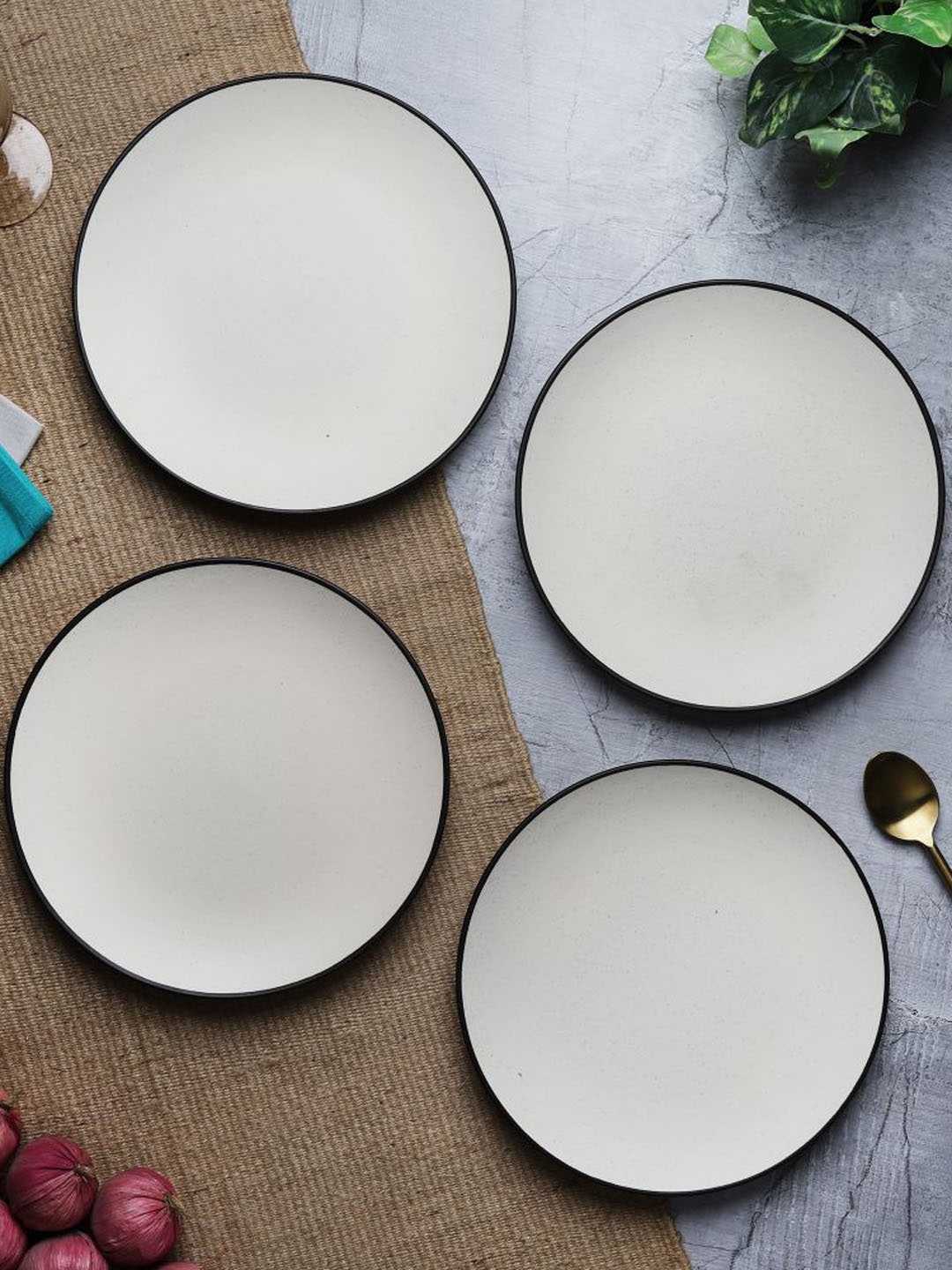 

The Decor Mart Off White 4 Pieces Ceramic Matte Plates