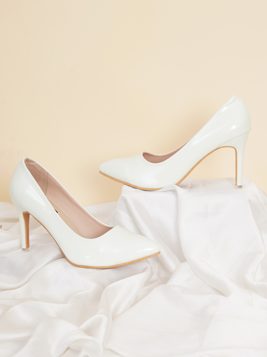 

Sherrif Shoes White Pointed Toe Pumps