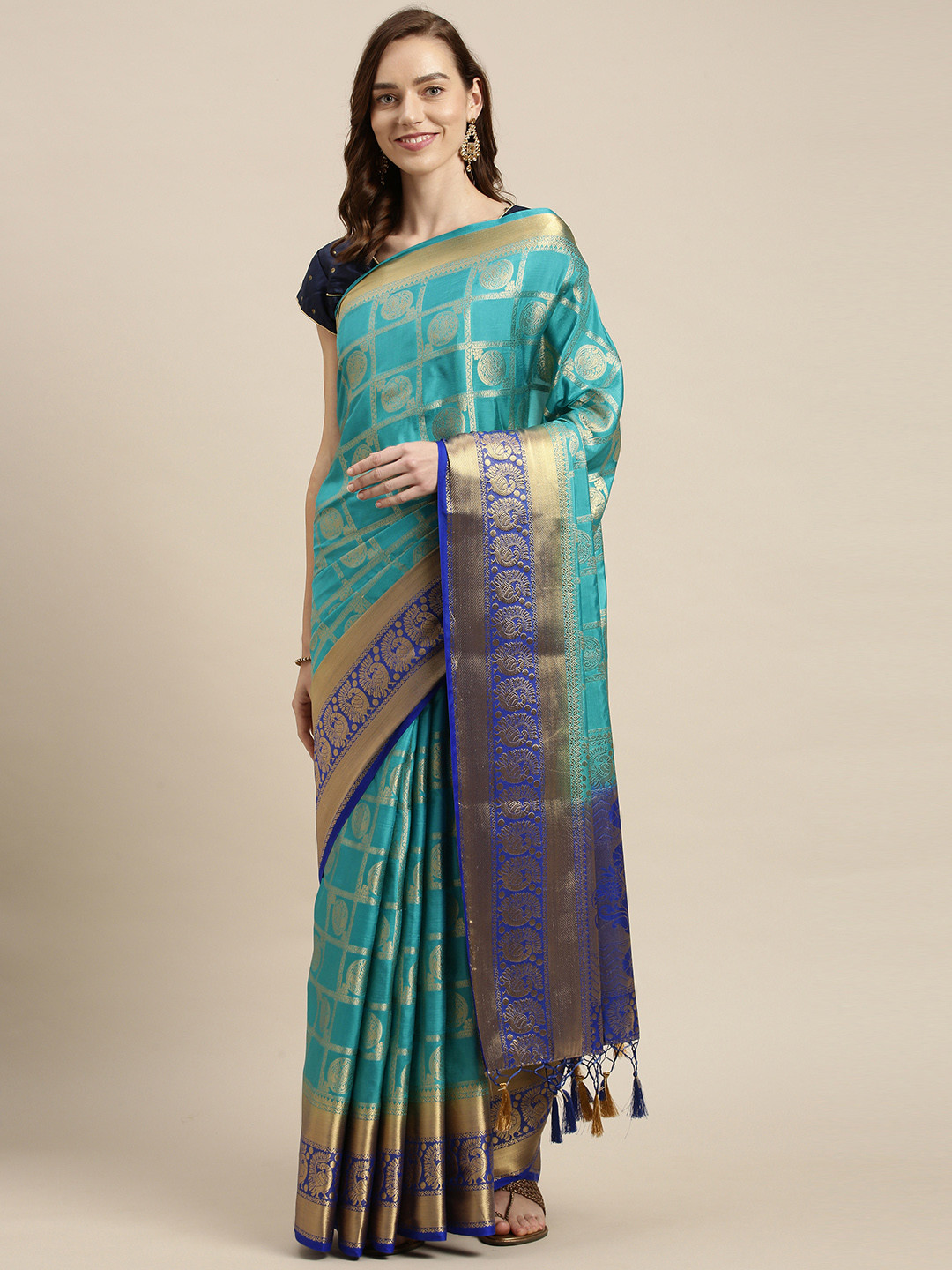 

Mitera Turquoise Blue & Gold-Toned Ethnic Motifs Zari Art Silk Kanjeevaram Saree