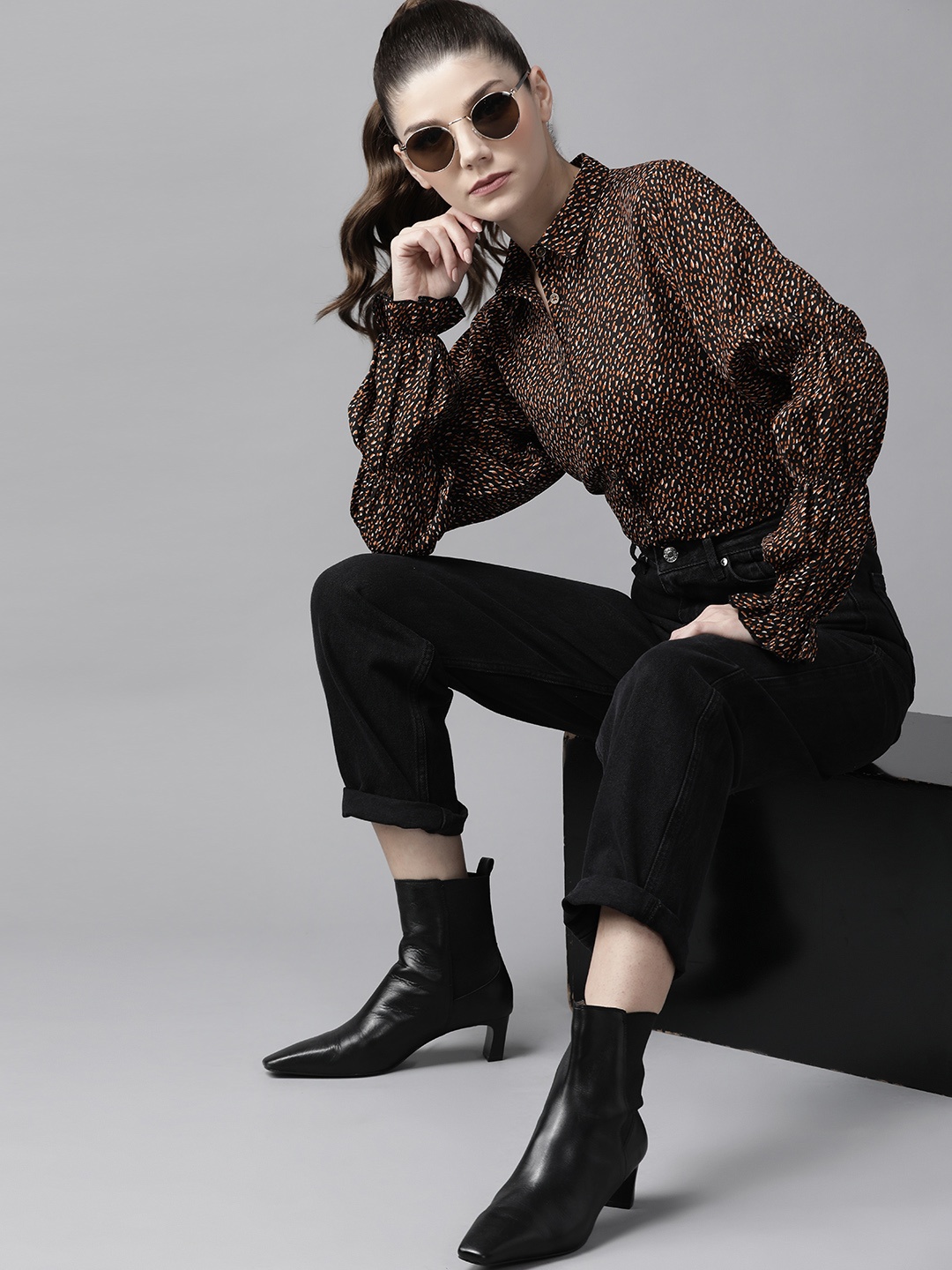 

Roadster Women Black & Orange Printed Sustainable Shirt