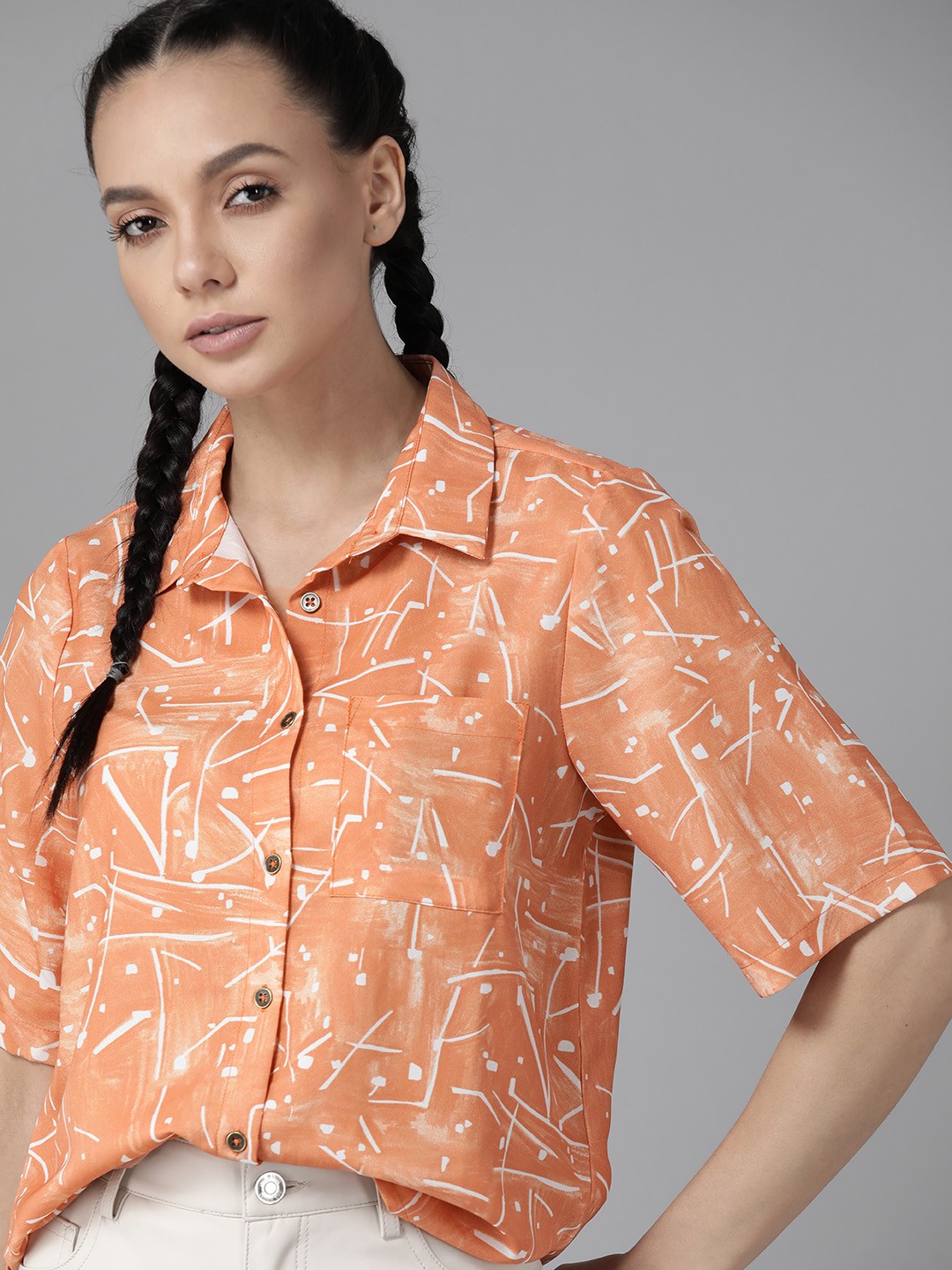 

Roadster Women Orange & White Opaque Printed Casual Shirt