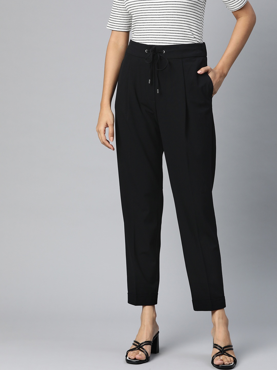 

Marks & Spencer Women Black Solid Loose Fit Pleated Trousers
