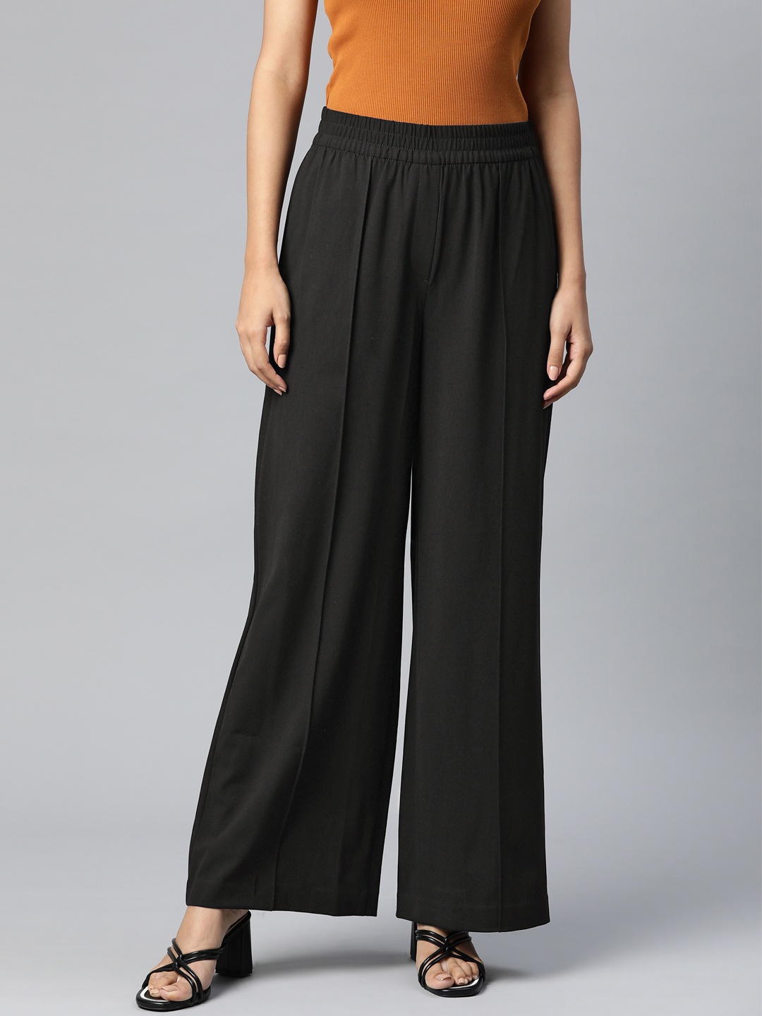 

Marks & Spencer Women Black Solid Loose Fit Pleated Parallel Trousers