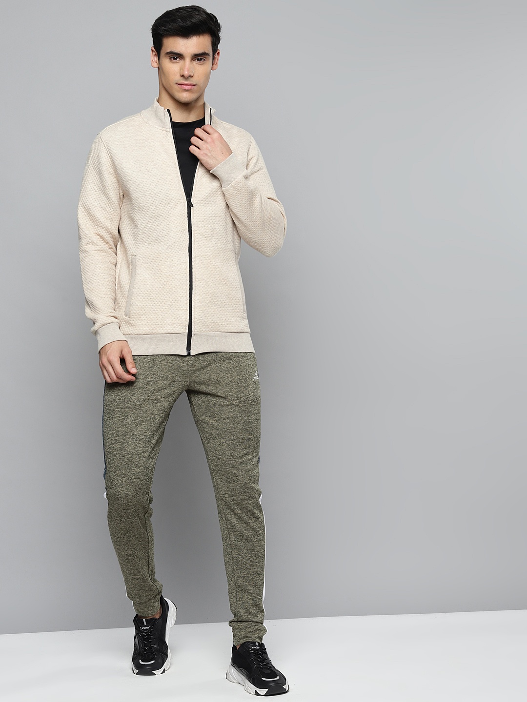 

Alcis Men Beige Solid Sweatshirt