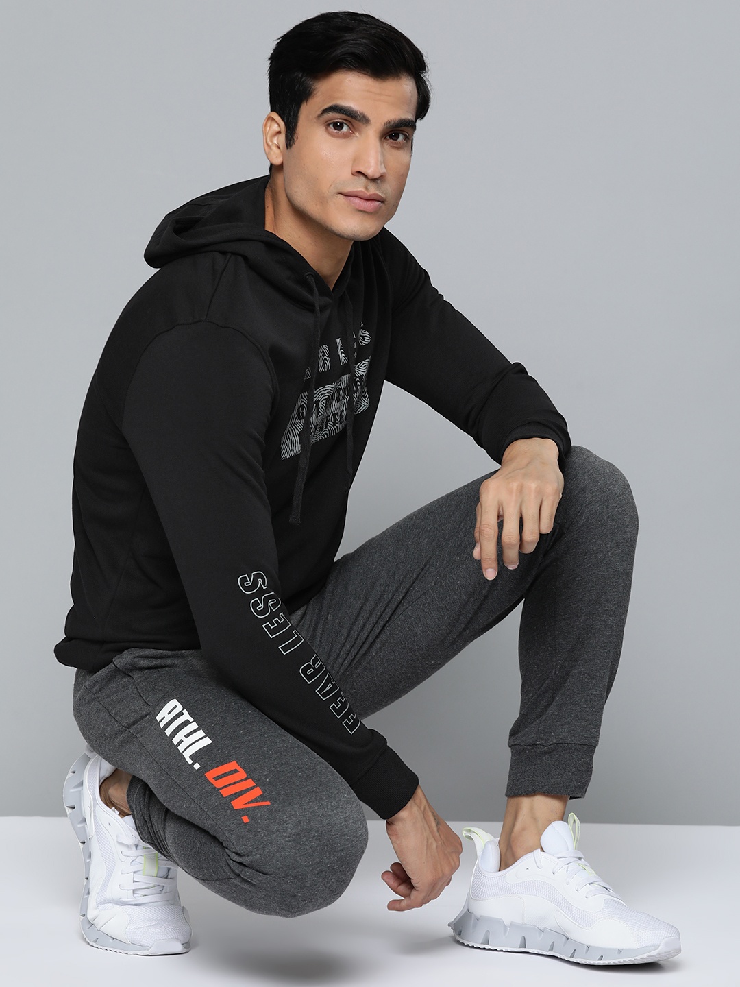 

Alcis Men Black Printed Hooded Sweatshirt