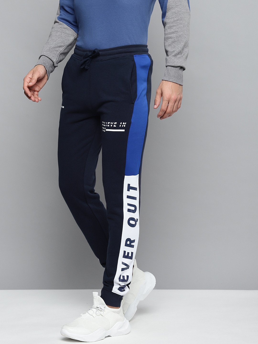 

Alcis Men Navy Blue Solid Slim Fit Joggers with Printed Detail