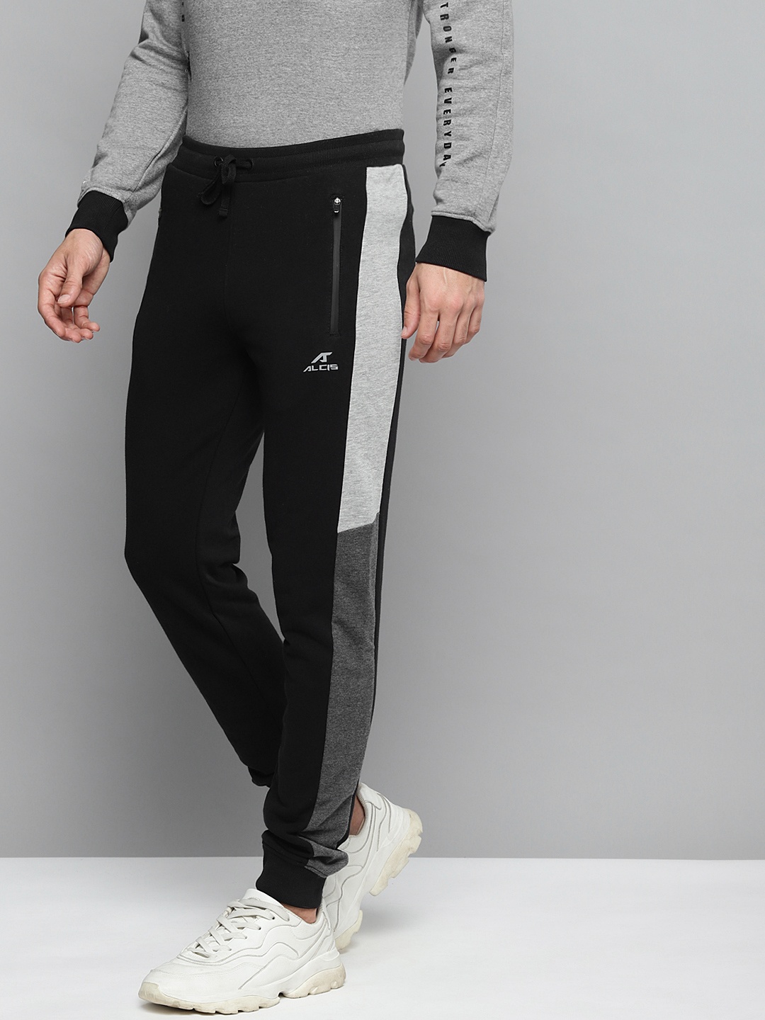 

Alcis Men Black Solid Slim Fit Joggers with Side Stripes