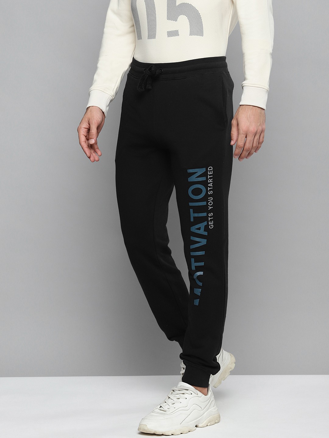 

Alcis Men Black Solid Slim Fit Joggers with Printed Detail