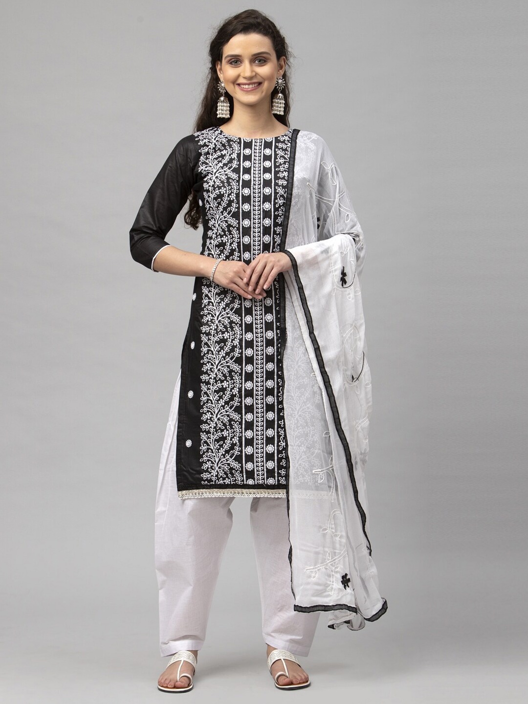 

Satrani Black & White Floral Embroidered Pure Cotton Unstitched Dress Material