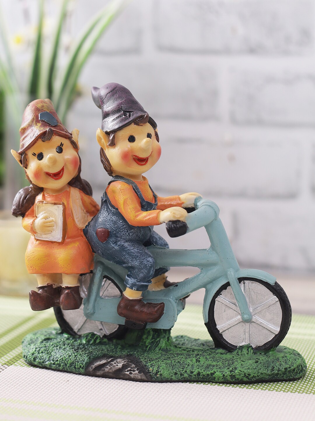 

CraftVatika Orange & Blue Cute Romantic Love Couple On Cycle Miniature Statue Showpiece