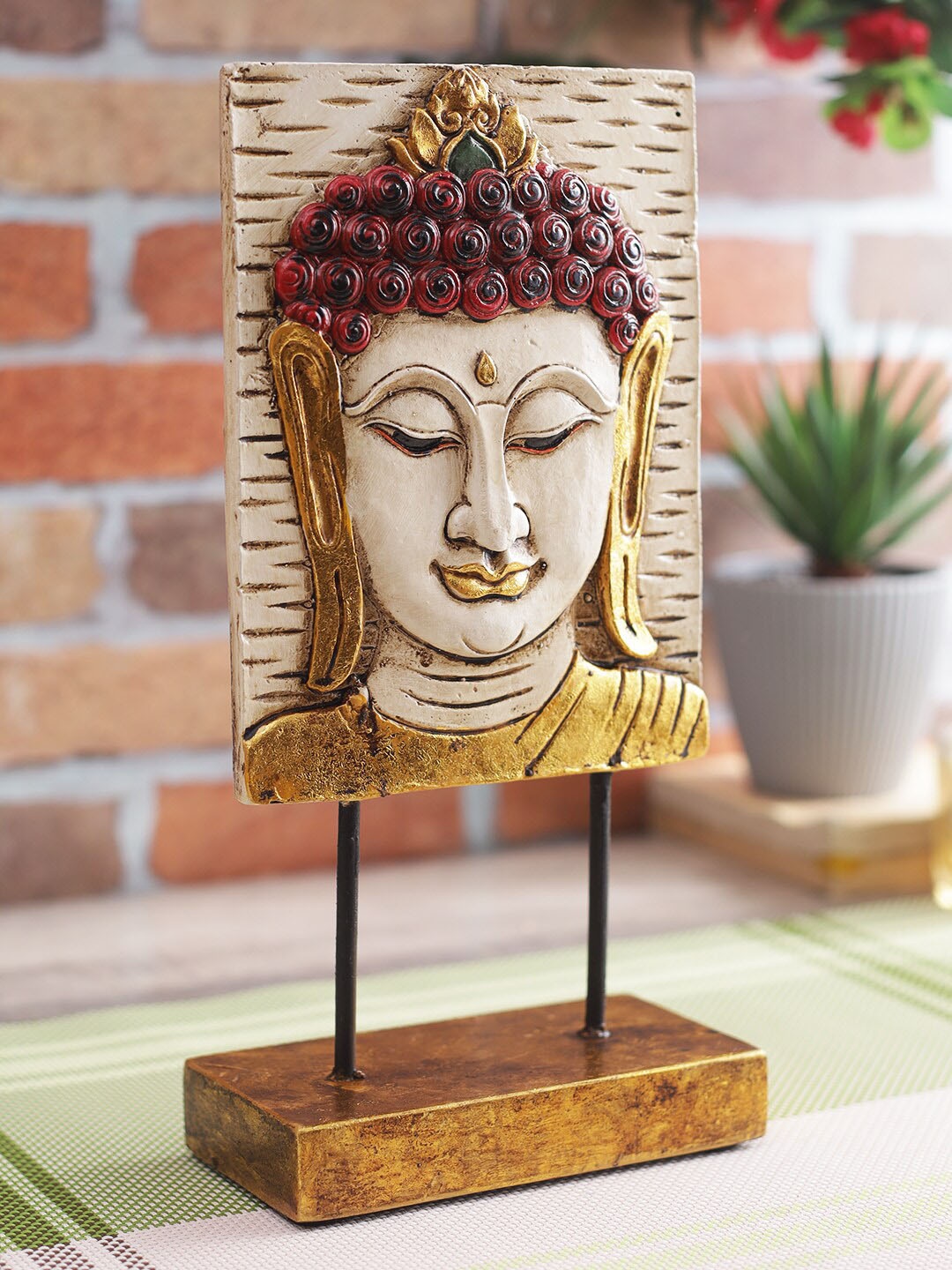 

CraftVatika Off-White & Gold-Toned Polyresin Handcrafted Buddha Face Showpiece
