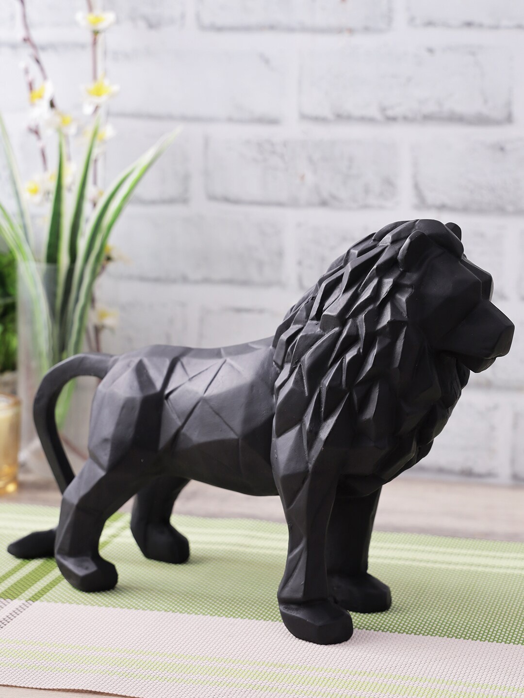 

CraftVatika Black Resin Animal Showpiece