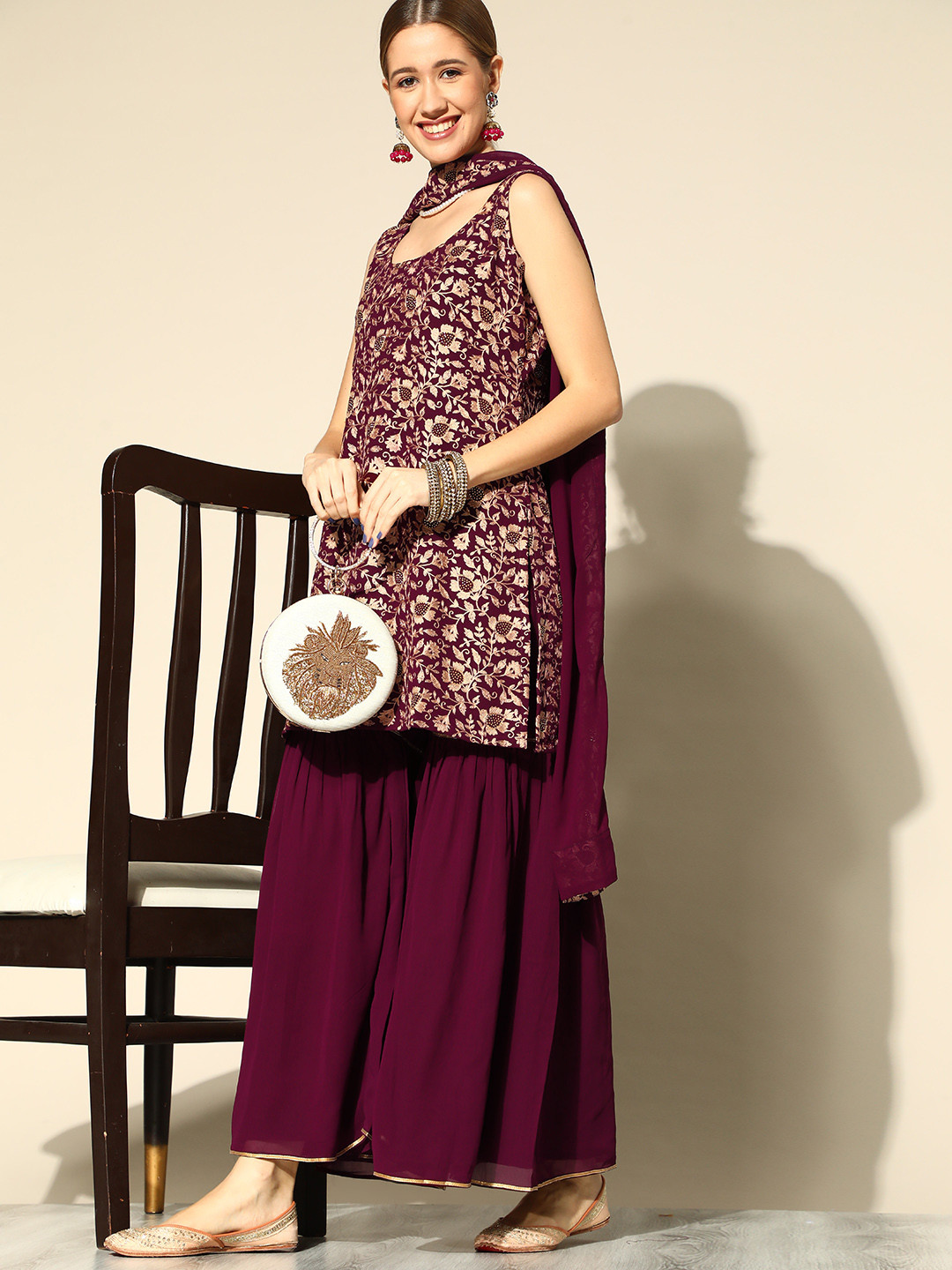 

Libas Women Burgundy Floral Embroidered Kurti with Sharara & Dupatta