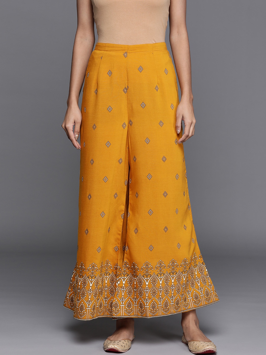 

Libas Women Mustard Yellow & Charcoal Grey Floral Printed Ethnic Palazzos