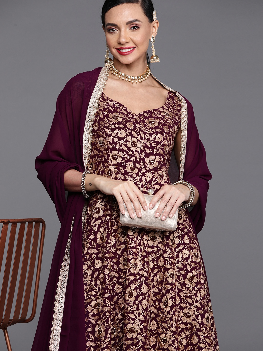 

Libas Women Maroon & Golden Embroidered Kurta with Trousers & Dupatta