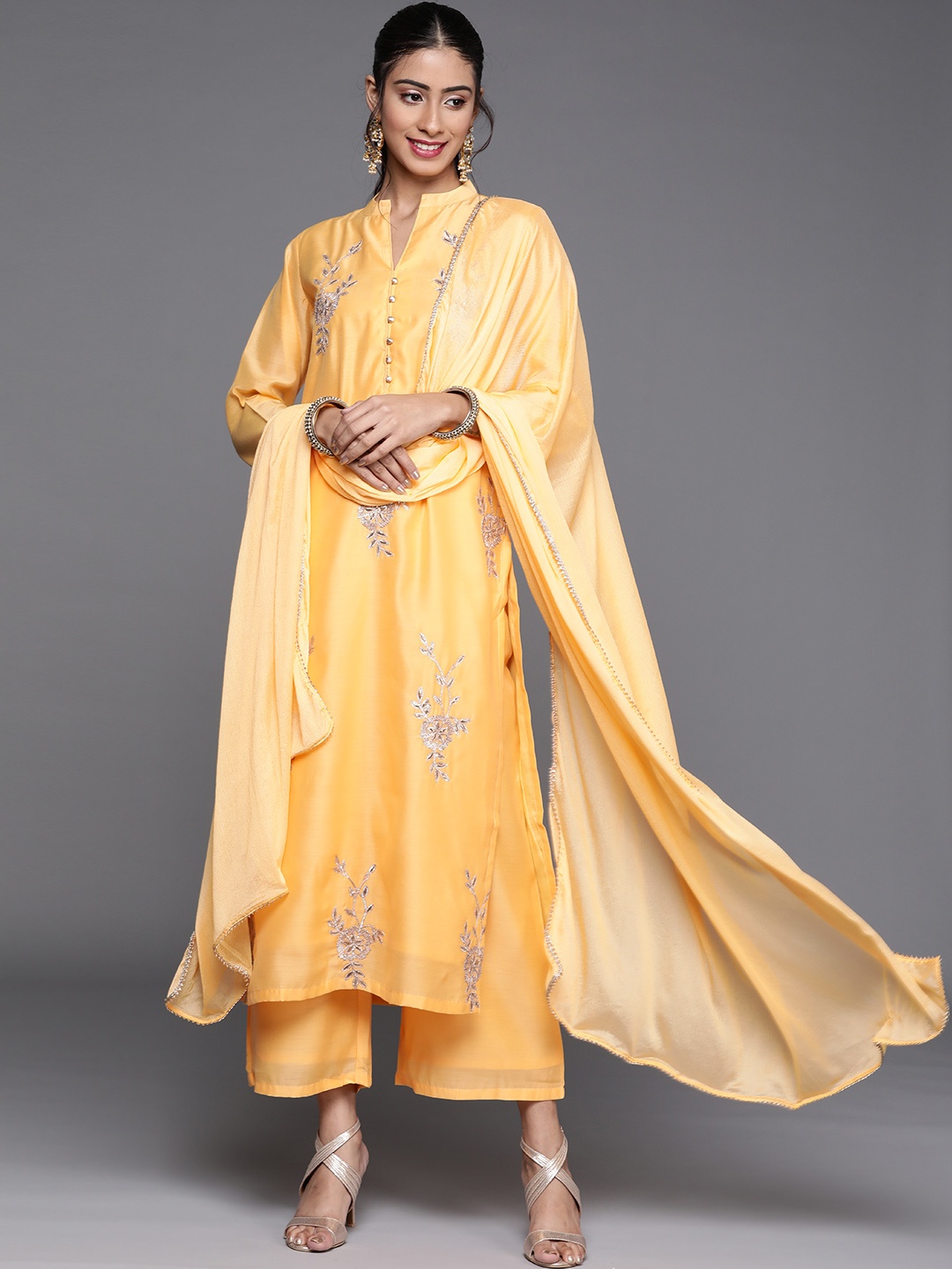 

Libas Women Yellow Floral Embroidered Regular Chanderi Silk Kurta with Palazzos & With Dupatta
