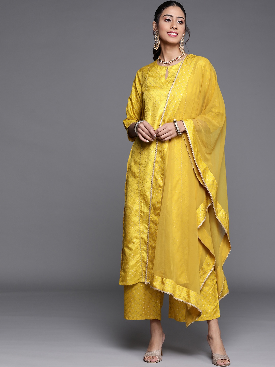 

Libas Women Yellow Printed Regular Sequinned Kurta with Palazzos & Dupatta
