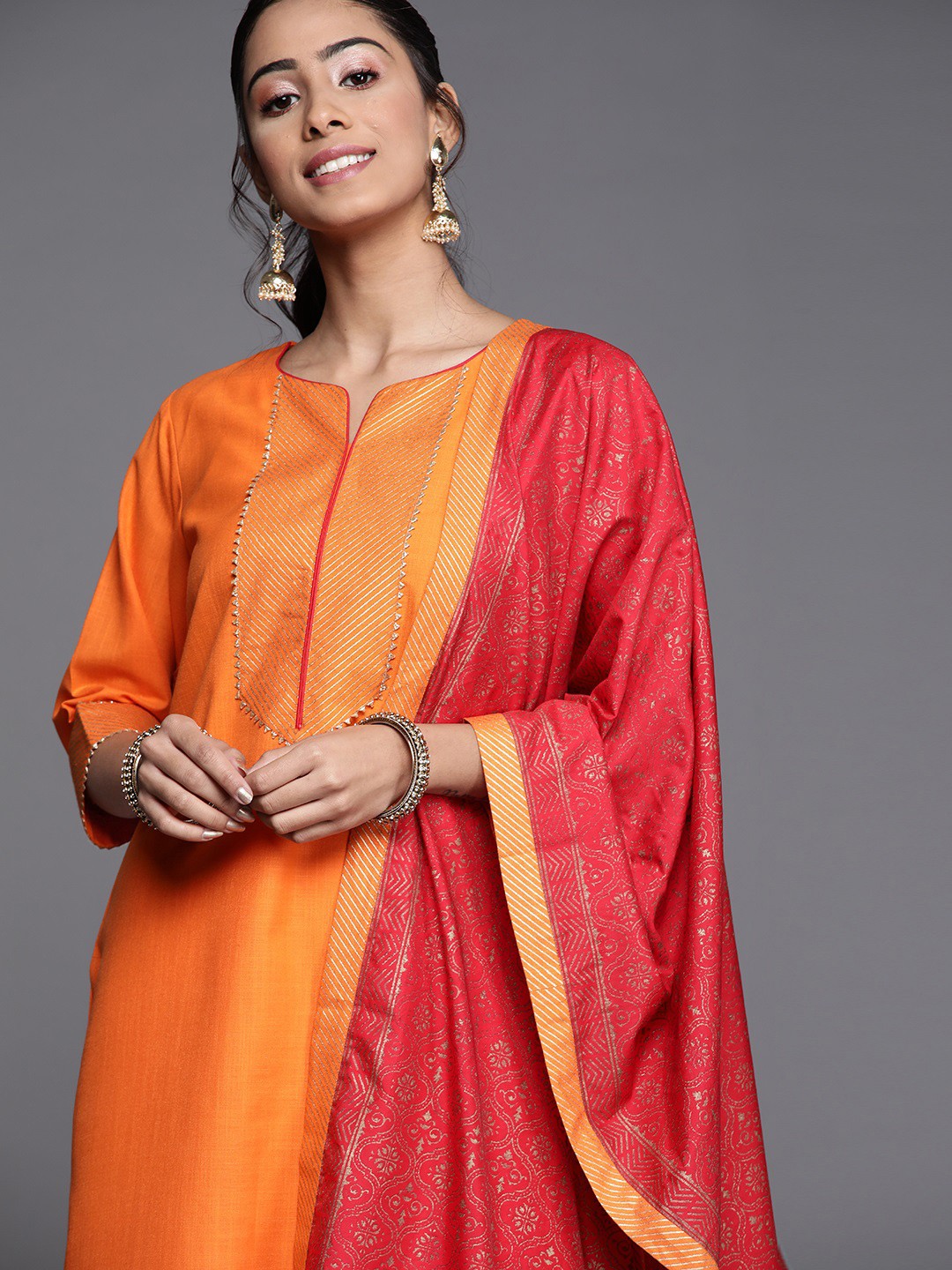 

Libas Women Orange Regular Pure Cotton Kurta with Palazzos & With Dupatta