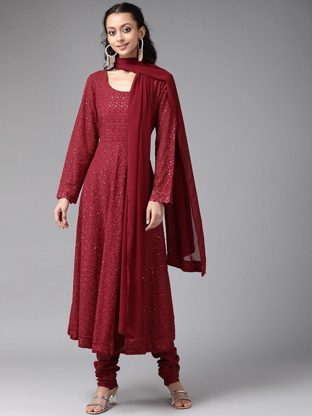 

Libas Women Maroon Regular Sequinned Kurta with Churidar & With Dupatta
