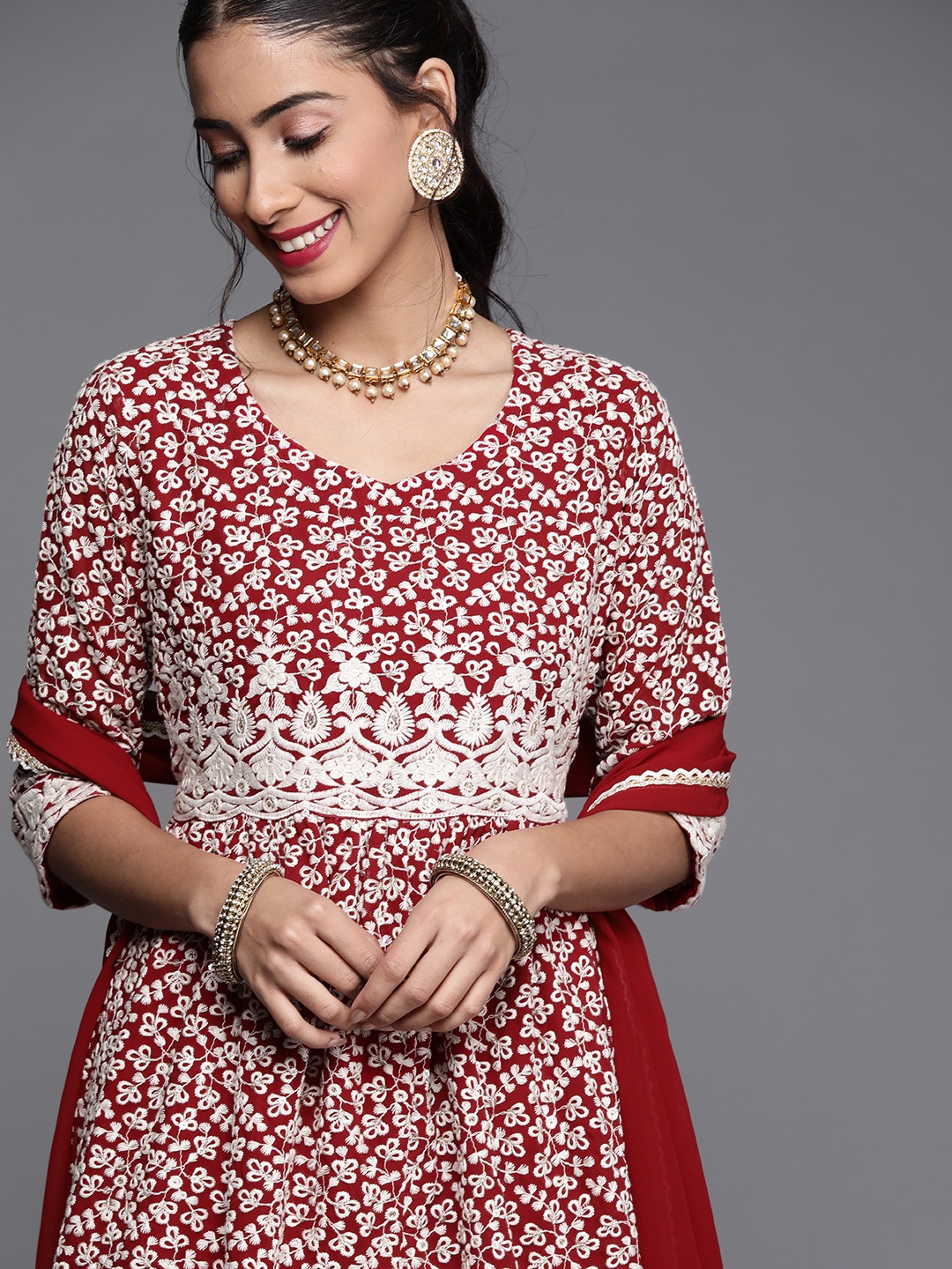 

Libas Women Maroon Floral Embroidered Panelled Thread Work Kurta with Palazzos & With Dupatta