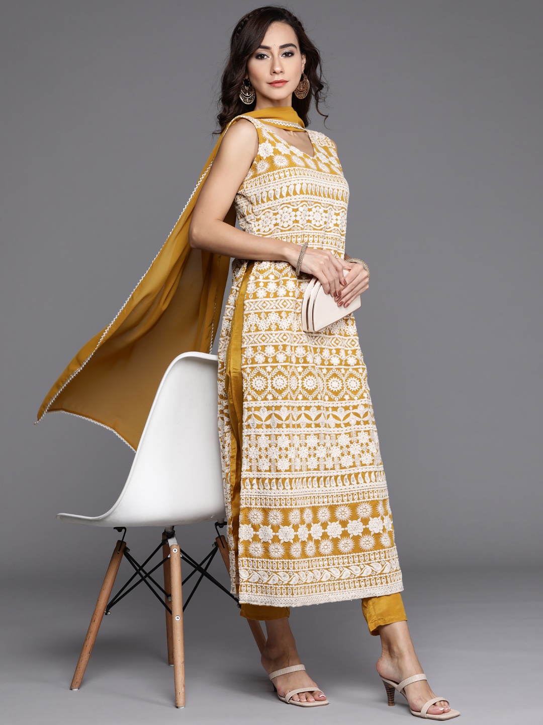 

Libas Women Mustard Yellow & White Ethnic Motifs Embroidered Kurta with Trousers & Dupatta