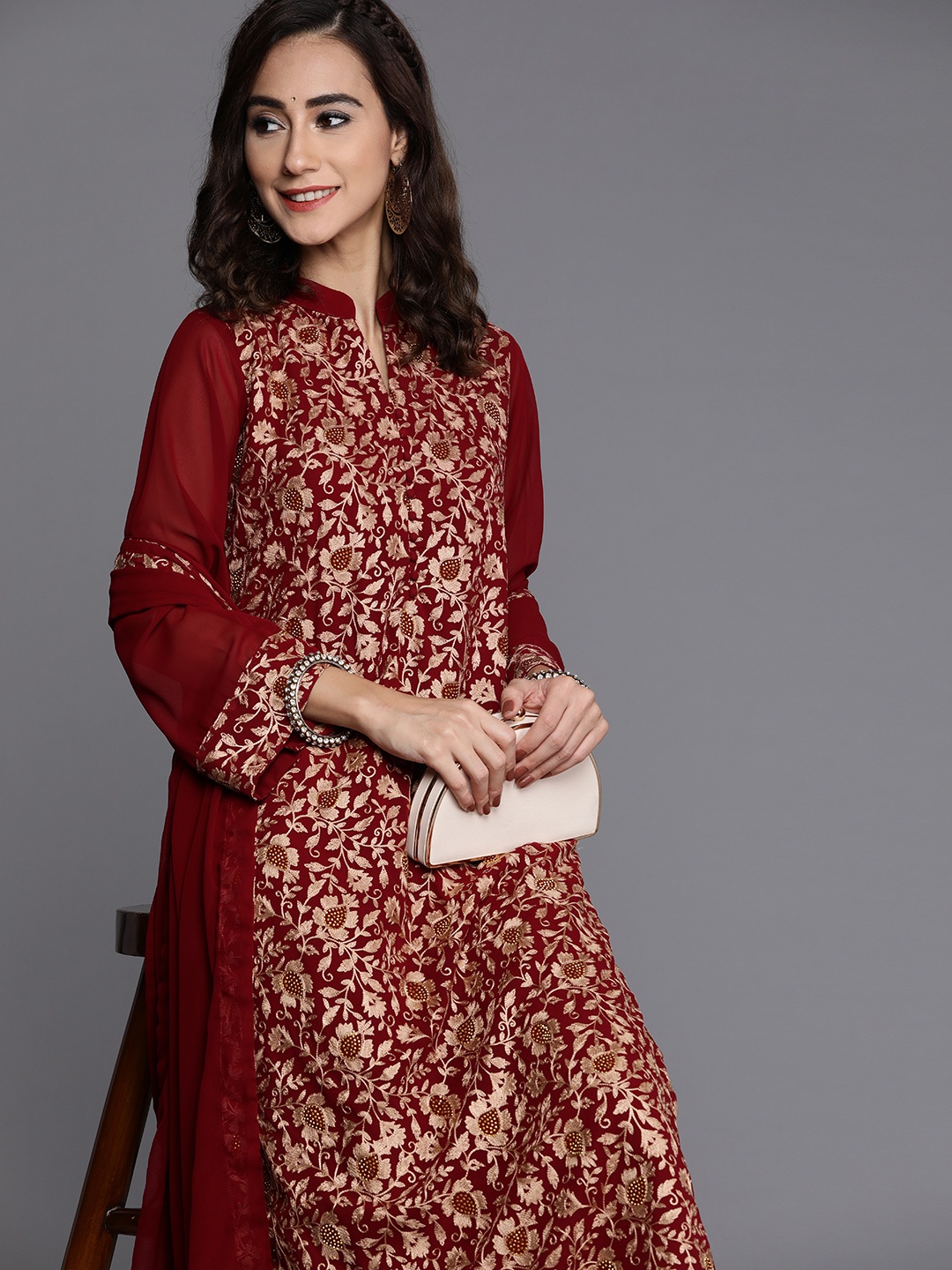 

Libas Women Maroon & Golden Embroidered Kurta with Palazzos & Dupatta