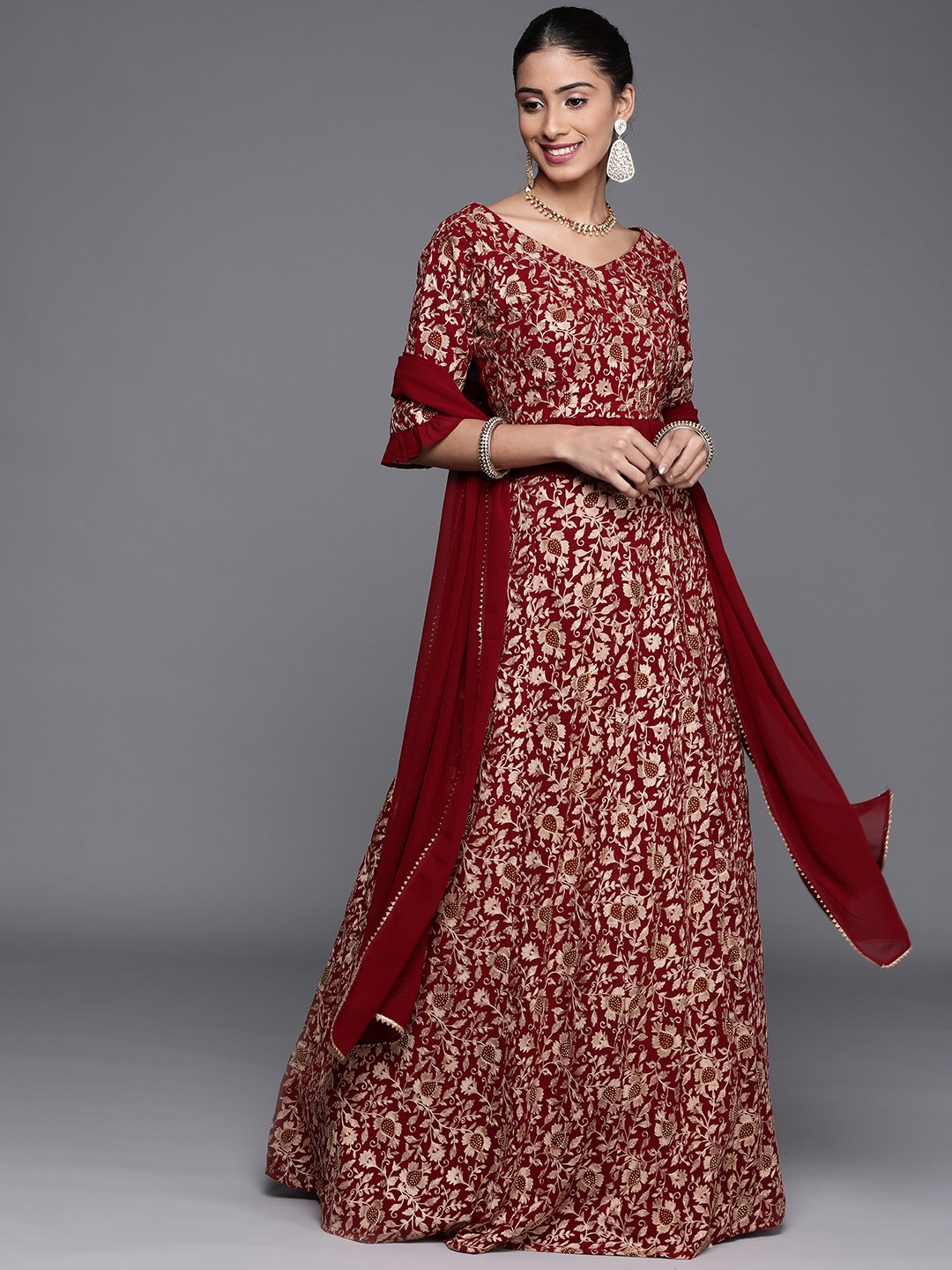 

Libas Maroon & Gold Embroidered Beads and Stones Ready to Wear Lehenga Blouse & Dupatta