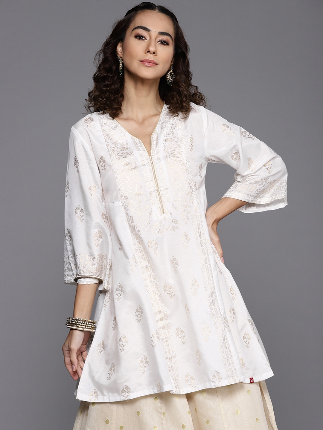 

Biba Women White & Golden Ethnic Motifs Printed Flared Sleeves Kurta