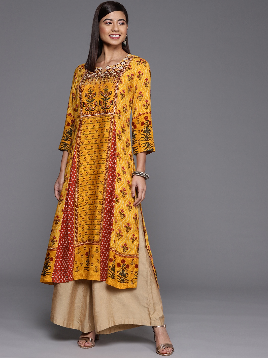 

Biba Women Mustard Yellow Printed Extended Sleeves Kurta