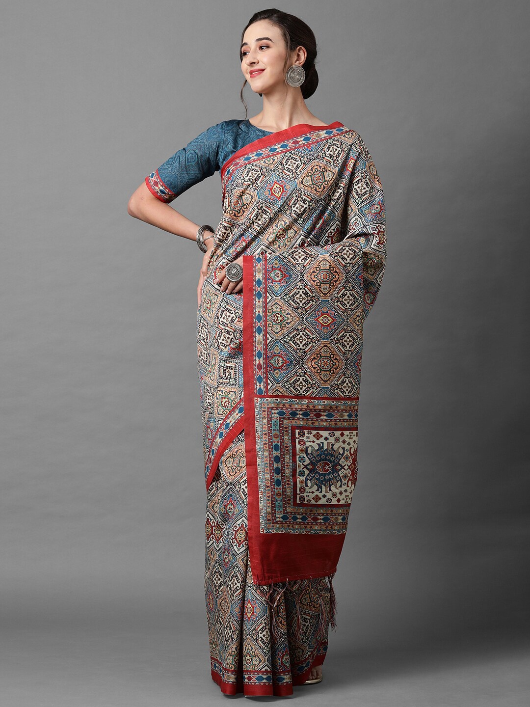 

Mitera Teal & Beige Silk Blend Saree