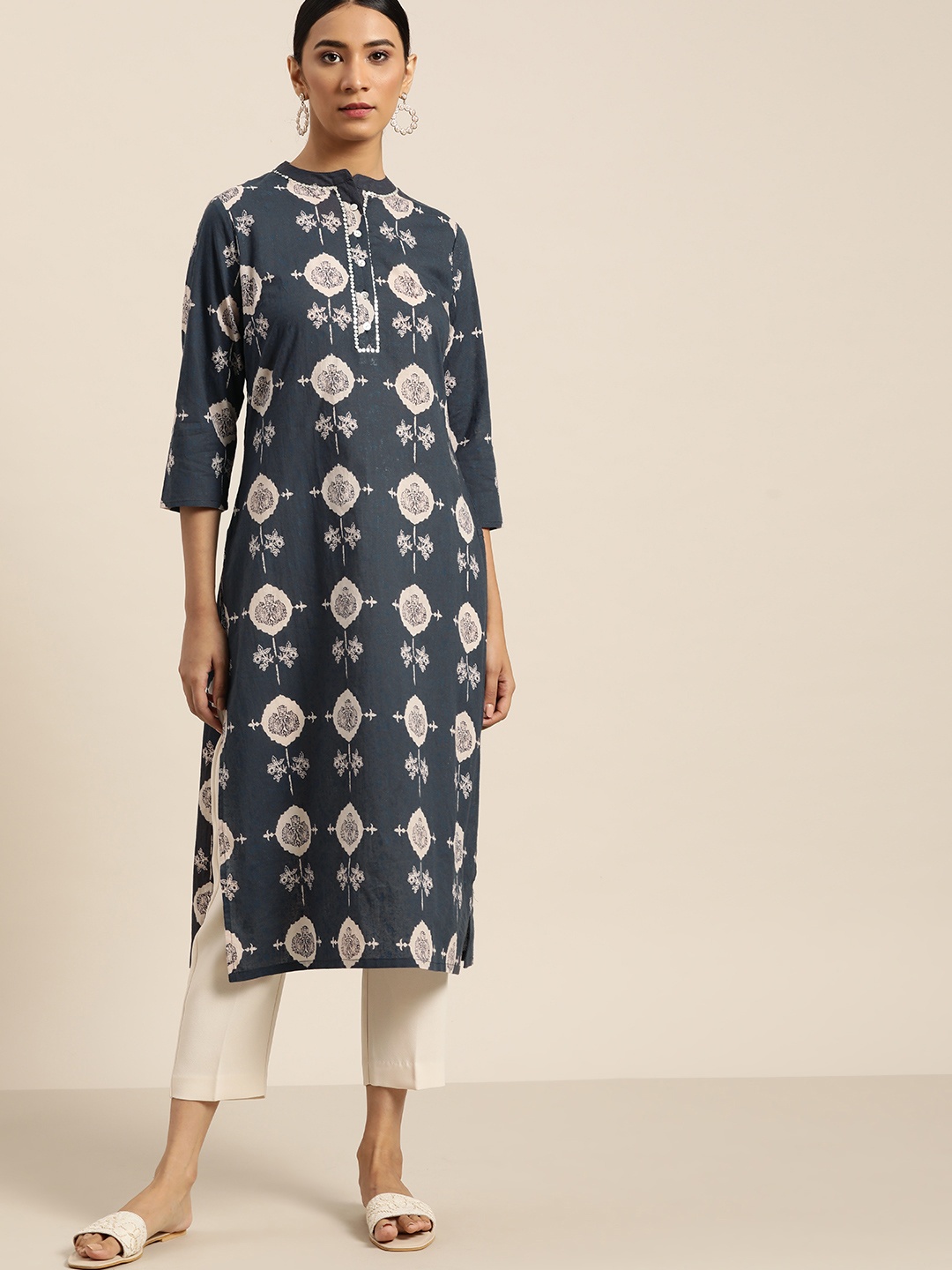 

Moda Rapido Women Navy Blue & Off-White Ethnic Motifs Print Cotton Straight Kurta