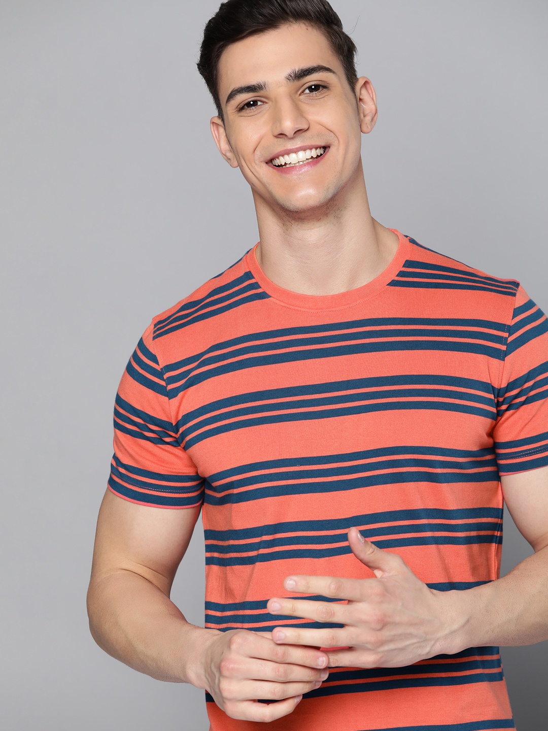 

Mast & Harbour Men Coral Red & Navy Blue Striped Pure Cotton T-shirt