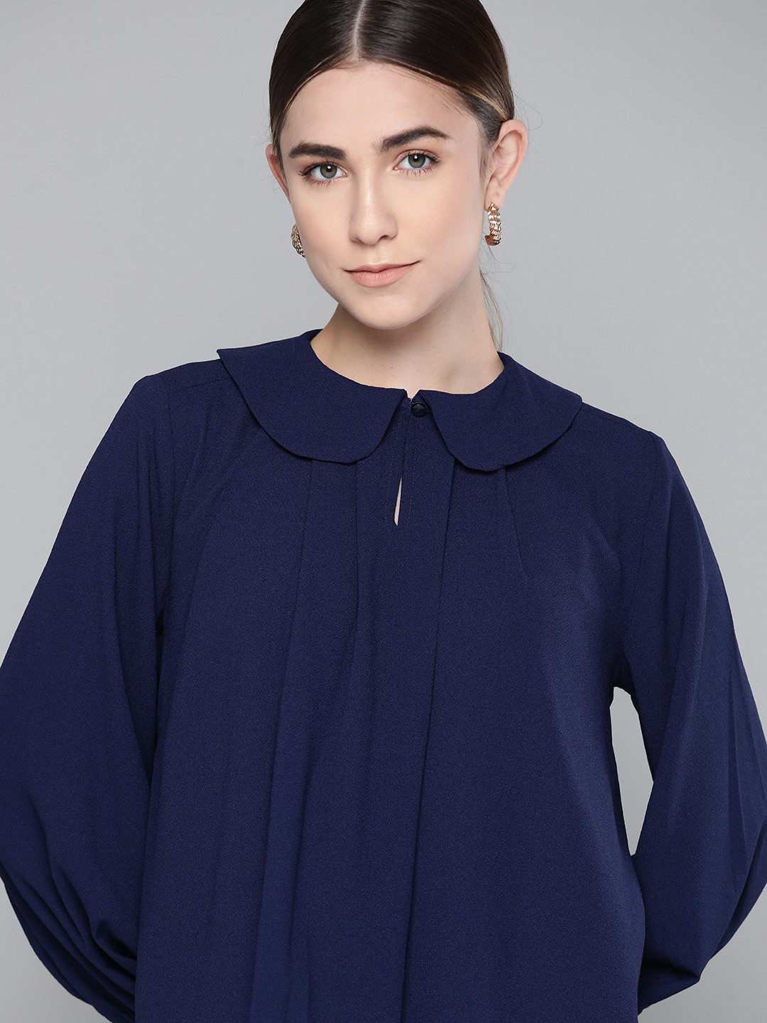 

Chemistry Navy Blue Solid Peter Pan Collar Top with Puff Sleeves