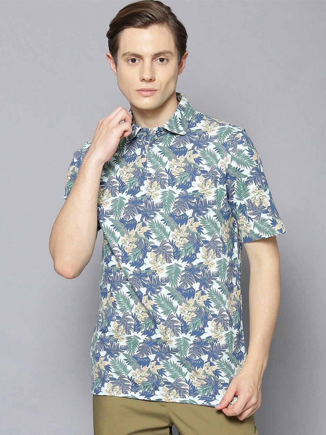 

Bruun & Stengade Men Blue & Green Floral Printed Polo Collar Tropical Slim Fit T-shirt