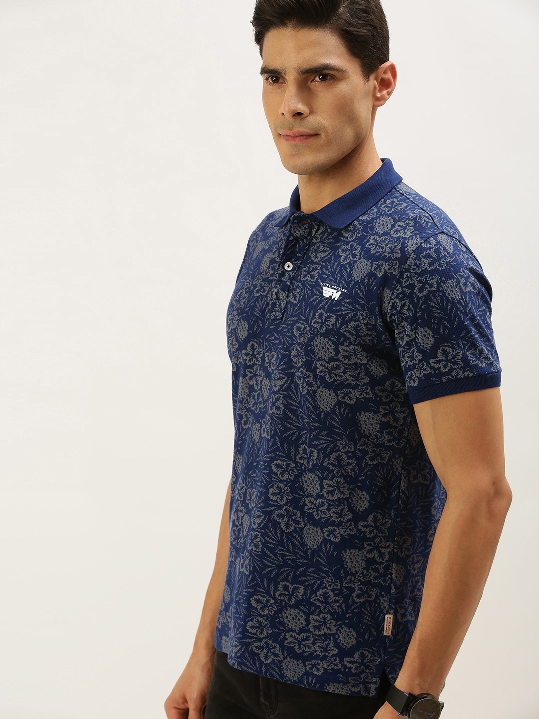 

Flying Machine Men Navy Blue Floral Printed Polo Collar T-shirt