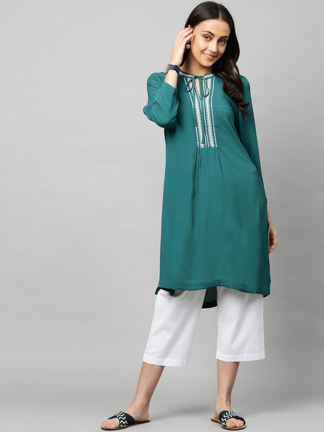 

Modern Indian by CHEMISTRY Women Teal & White Embroidered Kurta with Trousers