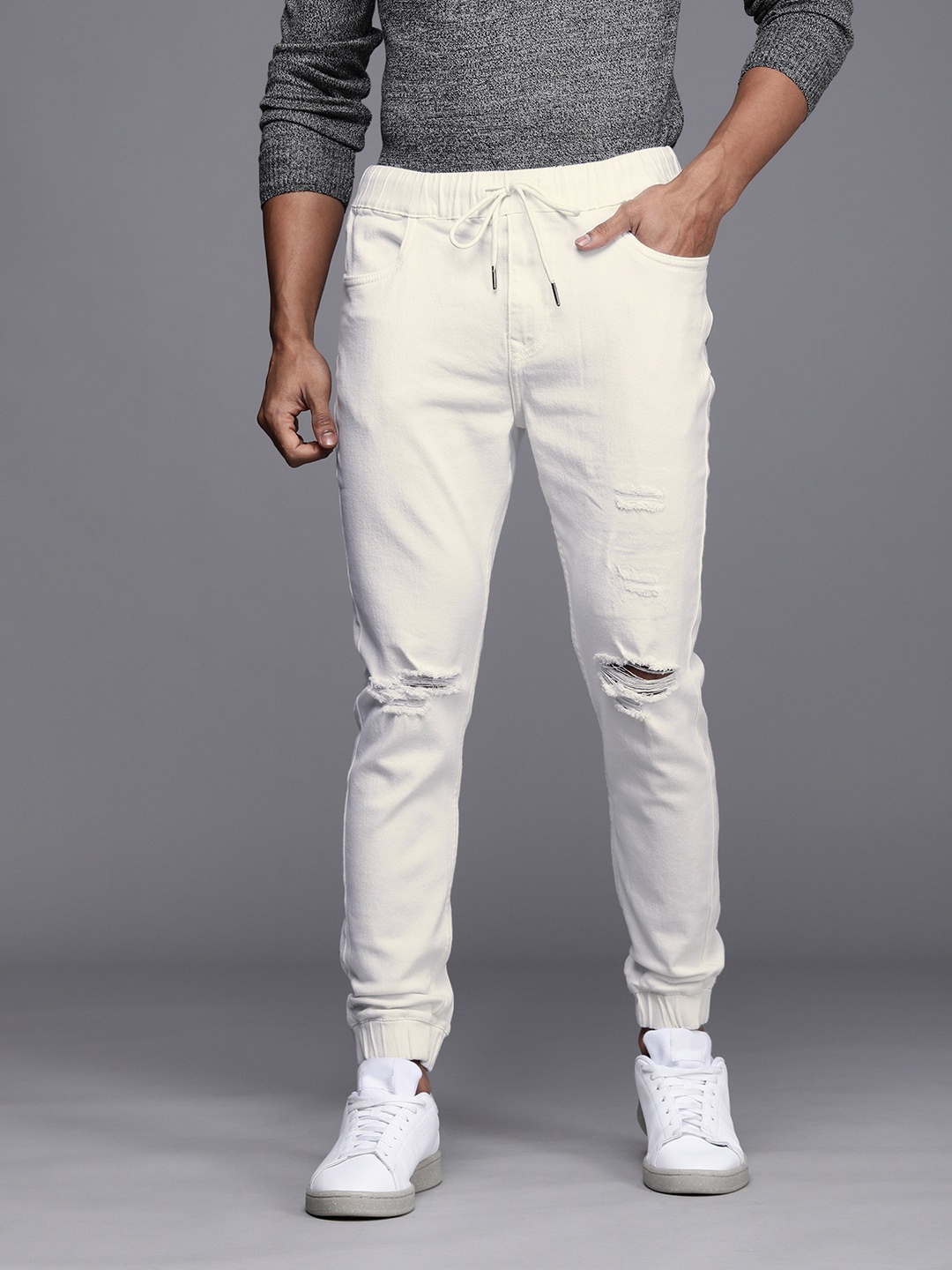 

WROGN Men White Jogger Fir Mid Rise Mildly Distressed Stretchable Jeans