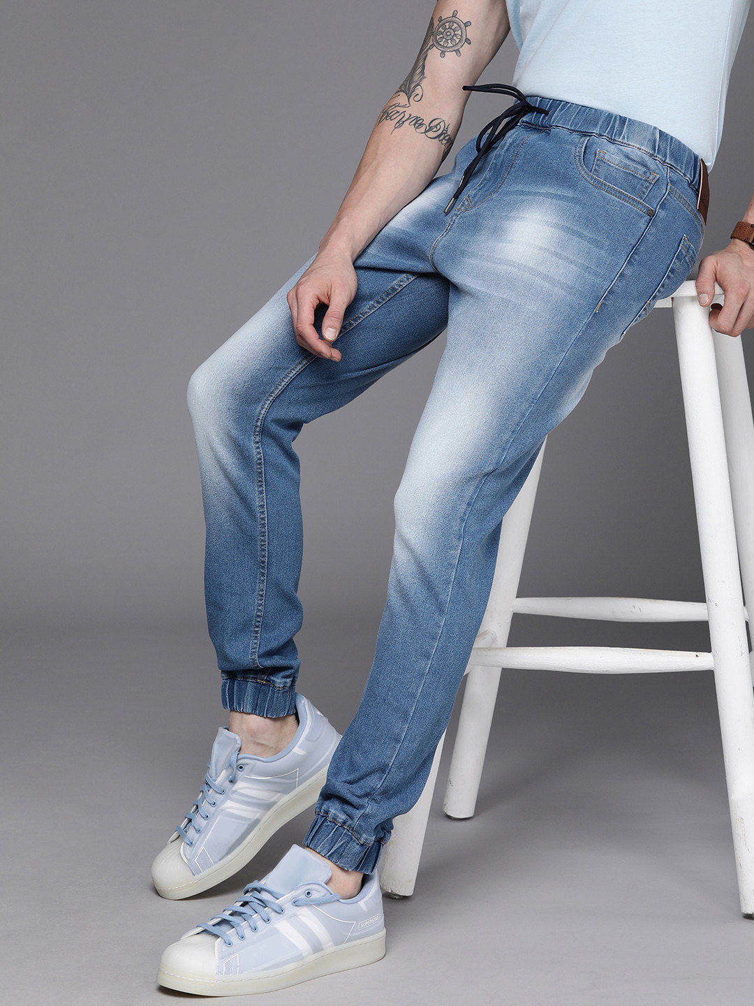 

WROGN Men Blue Jogger Heavy Fade Stretchable Jeans