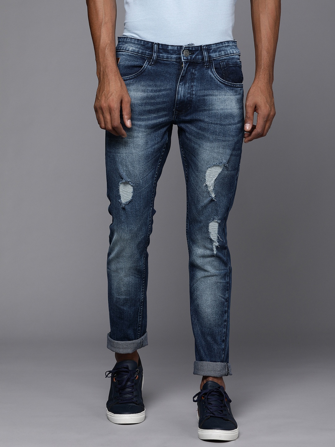 

WROGN Men Blue Slim Fit Mid-Rise Mildly Distressed Heavy Fade Stretchable Jeans