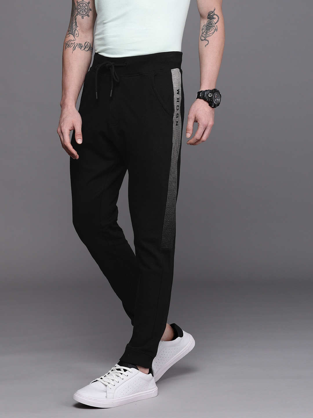 

WROGN MEN BLACK PRINTED BRAND LOGO SLIM FIT PURE COTTON TRACK PANTS