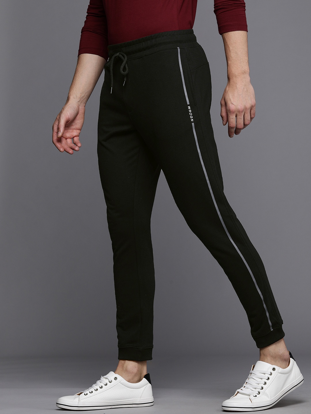 

Wrogn Men Black Solid Mid-Rise Regular Fit Joggers Track Pants With Side Stripes