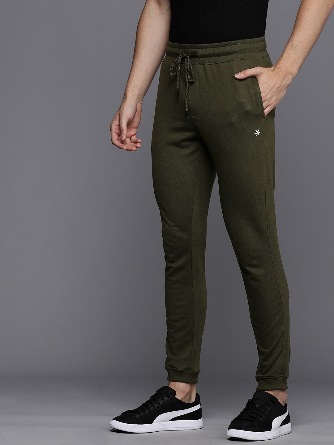 

Wrogn Men Olive Green Solid Mid-Rise Regular Fit Joggers Track Pants