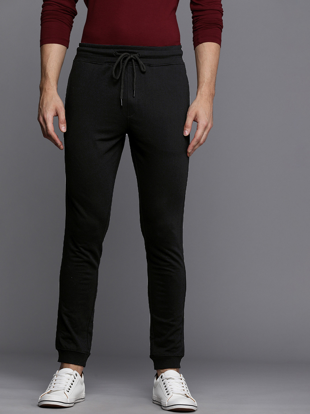 

Wrogn Men Black Solid Mid-Rise Regular Fit Joggers Track Pants